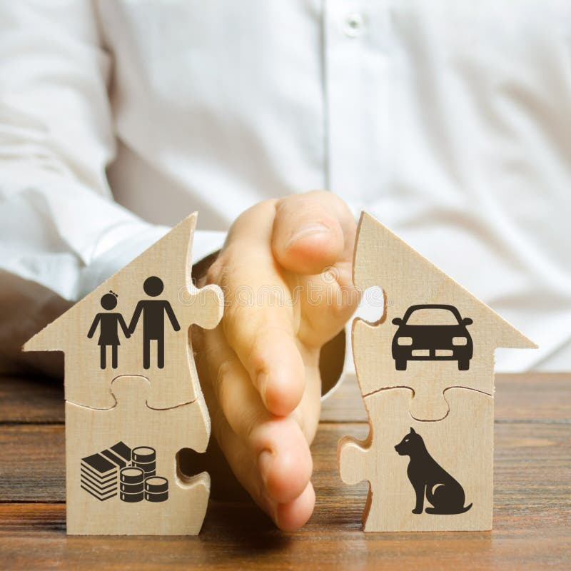 Dividing family assets during divorce – symbolic image of separation between home, finances, and relationships